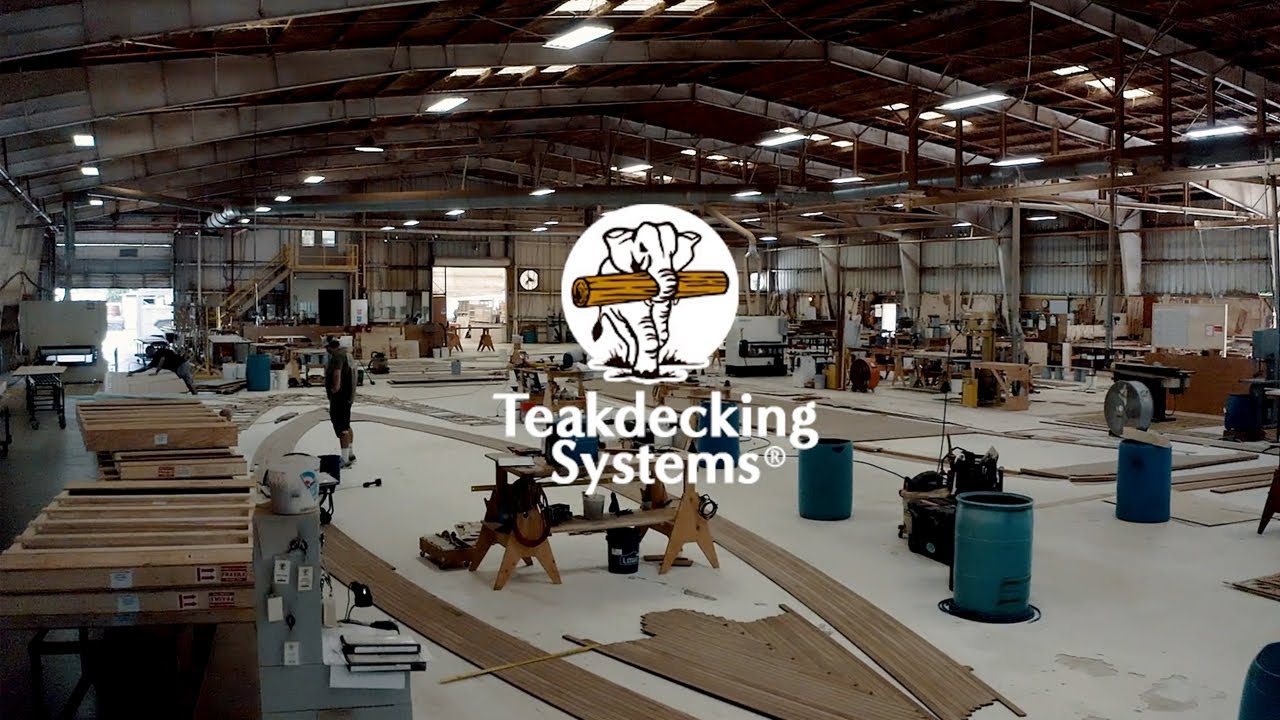 Teakdecking Systems factory with the company logo